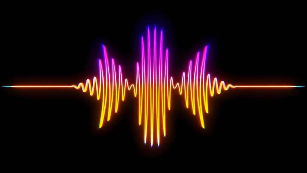 Colorful soundwave graphic on a black background