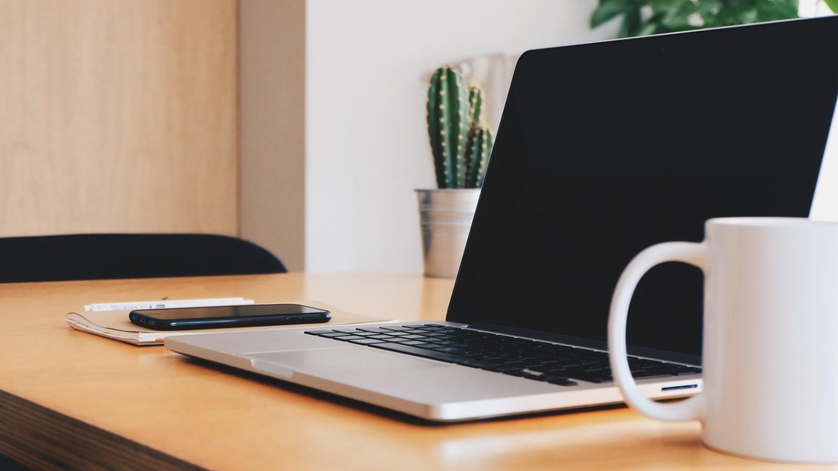 Office, desk, coffee cup — IronFX User Experience: Seamless Trading, Fast Execution, and a User-Friendly Platform Designed fo