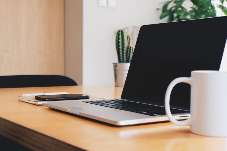 Office, desk, coffee cup — IronFX User Experience: Seamless Trading, Fast Execution, and a User-Friendly Platform Designed fo